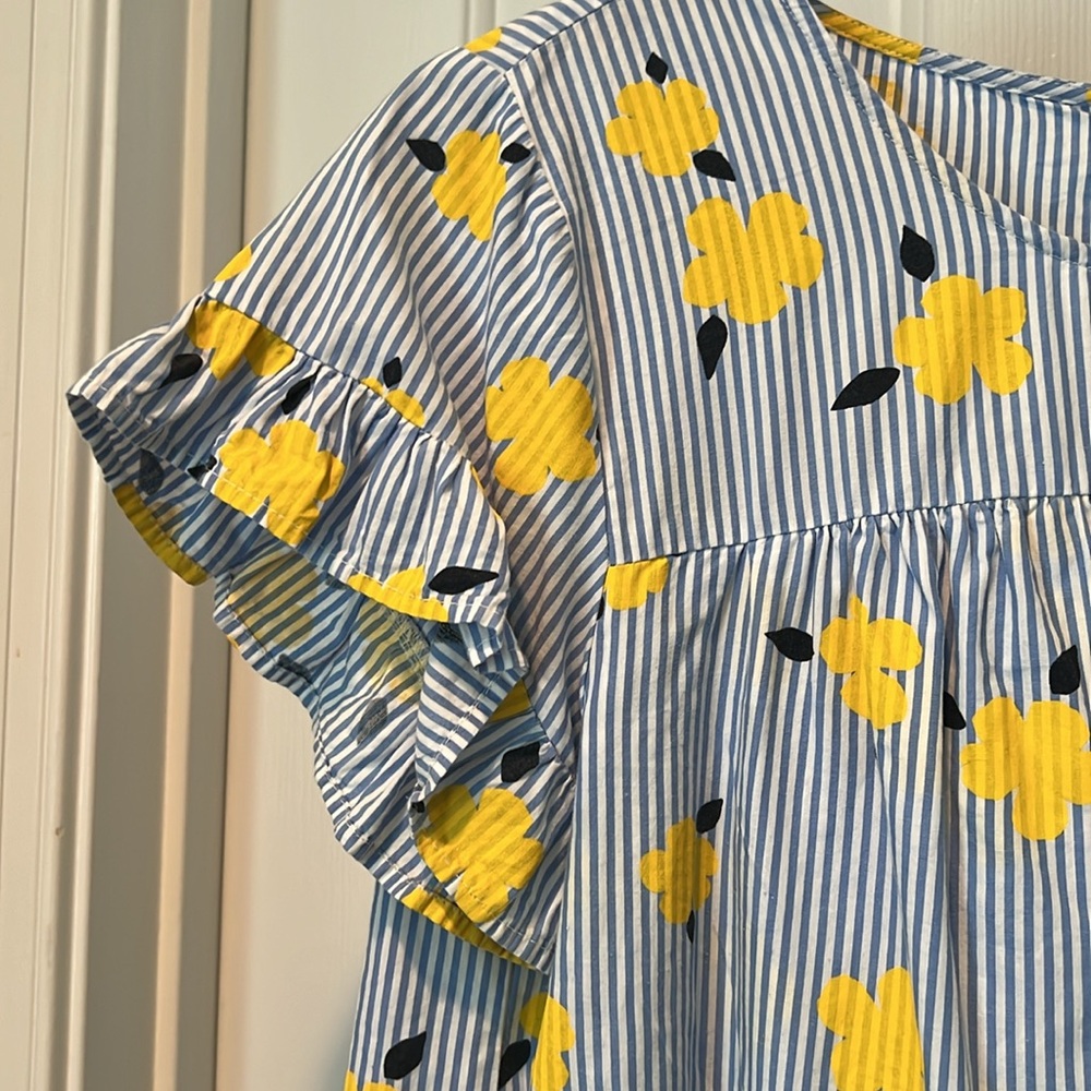 Crown & Ivy blue, and white striped shirt with flower detail.